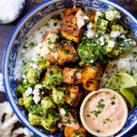 These Chipotle Agave Tofu Bowls have marinated & baked tofu, steamed rice and a avocado jalapeño salsa. The perfect vegan dinner | ThisSavoryVegan.com #thissavoryvegan #tofurecipes #vegandinnerideas