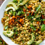 This Chipotle Sweet Potato Pasta Salad is filled with roasted sweet potato, chickpeas, pasta, red onion, cilantro & a creamy vegan chipotle dressing | ThisSavoryVegan.com #thissavoryvegan #pastasalad #summerrecipes