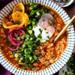 This Salsa Verde Bean & Rice Soup is comforting, filling and healthy. Filled with veggies & pinto beans and served with steamed rice | ThisSavoryVegan.com #thissavoryvegan #winterrecipes #fallrecipes