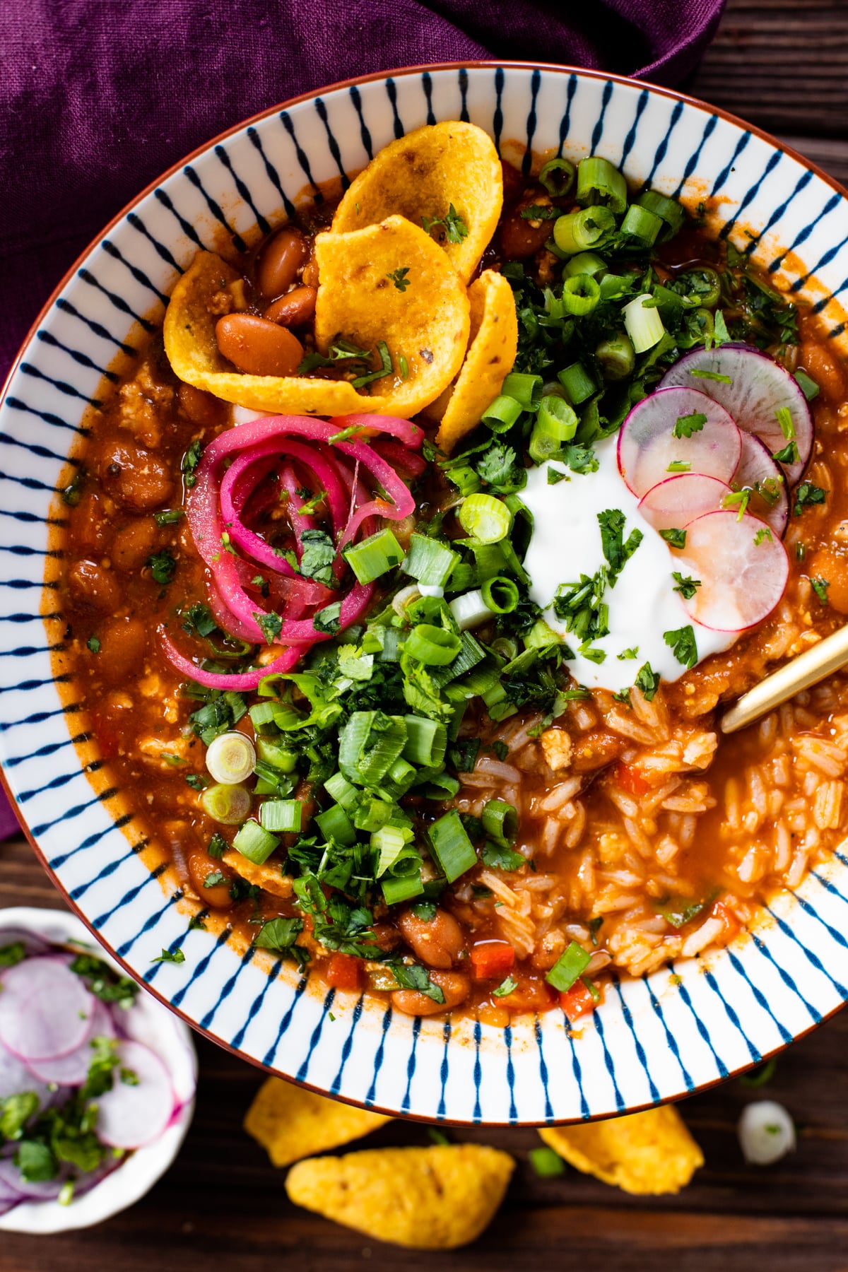 This Salsa Verde Bean & Rice Soup is comforting, filling and healthy. Filled with veggies & pinto beans and served with steamed rice | ThisSavoryVegan.com #thissavoryvegan #winterrecipes #fallrecipes