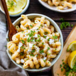 This Creamy Greek Pasta is a vegan dream! Creamy non-dairy sauce made with vegan feta & parmesan, sun-dried tomatoes & garlic | ThisSavoryVegan.com #thissavoryvegan #nondairypasta #veganpasta