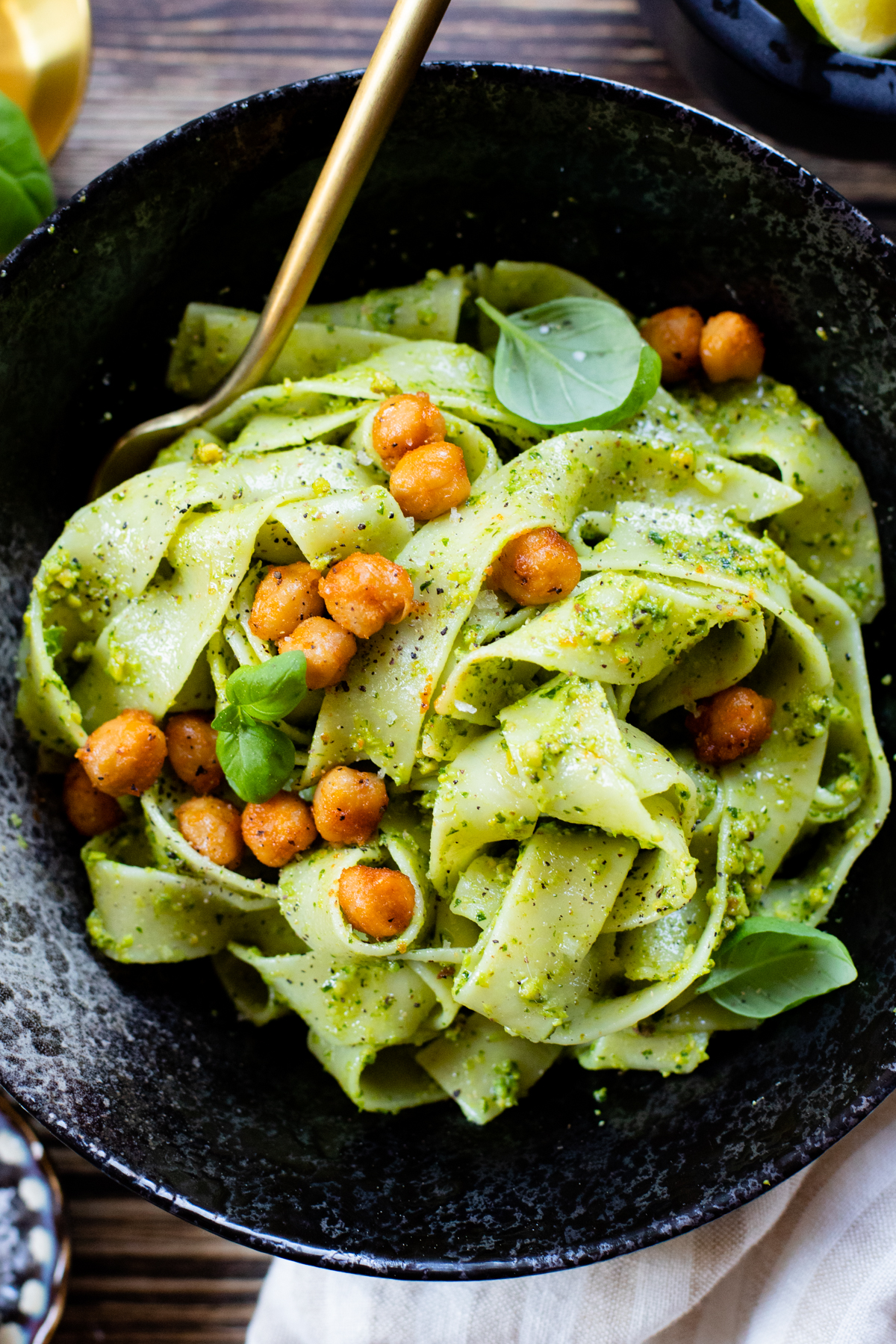 This Pistachio Pesto Pasta is dairy-free, vegan and totally delicious! Made with cilantro, garlic & pistachios and served with crispy chickpeas | ThisSavoryVegan.com #thissavoryvegan #veganpasta #cilantropesto