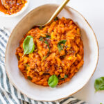 This Spicy Soyrizo & Orzo Skillet is the perfect one-pot weeknight dinner! Creamy tomato sauce, crispy soyrizo, tender orzo & plenty of veggies | ThisSavoryVegan.com #thissavoryvegan #onepotrecipes #vegandinnerideas