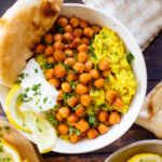 This Turmeric Coconut Rice & Crispy Chickpeas is an easy weeknight dinner or lunch. The rice is creamy & flavor packed and the chickpeas add a nice crunch | ThisSavoryVegan.com #thissavoryvegan #easydinnerideas #quickdinners