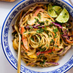 This Cold Tahini Noodle Salad is the perfect lunch or dinner during warm weather. Crispy veggies, chilled noodles and a spicy tahini sauce | ThisSavoryVegan.com #thissavoryvegan #nutfreerecipes #vegansalads