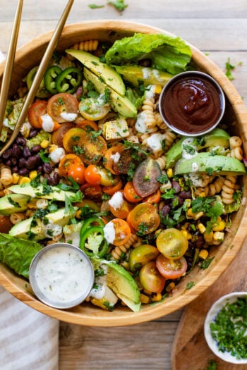 Nothing says summer like this vegan BBQ Ranch Pasta Salad - cold noodles, veggies & black beans with homemade vegan ranch & BBQ sauce | ThisSavoryVegan.com #pastasalad #summerrecipes #veganranch