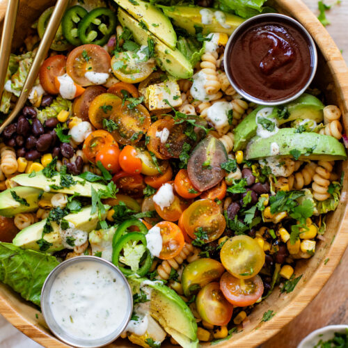 Nothing says summer like this vegan BBQ Ranch Pasta Salad - cold noodles, veggies & black beans with homemade vegan ranch & BBQ sauce | ThisSavoryVegan.com #pastasalad #summerrecipes #veganranch