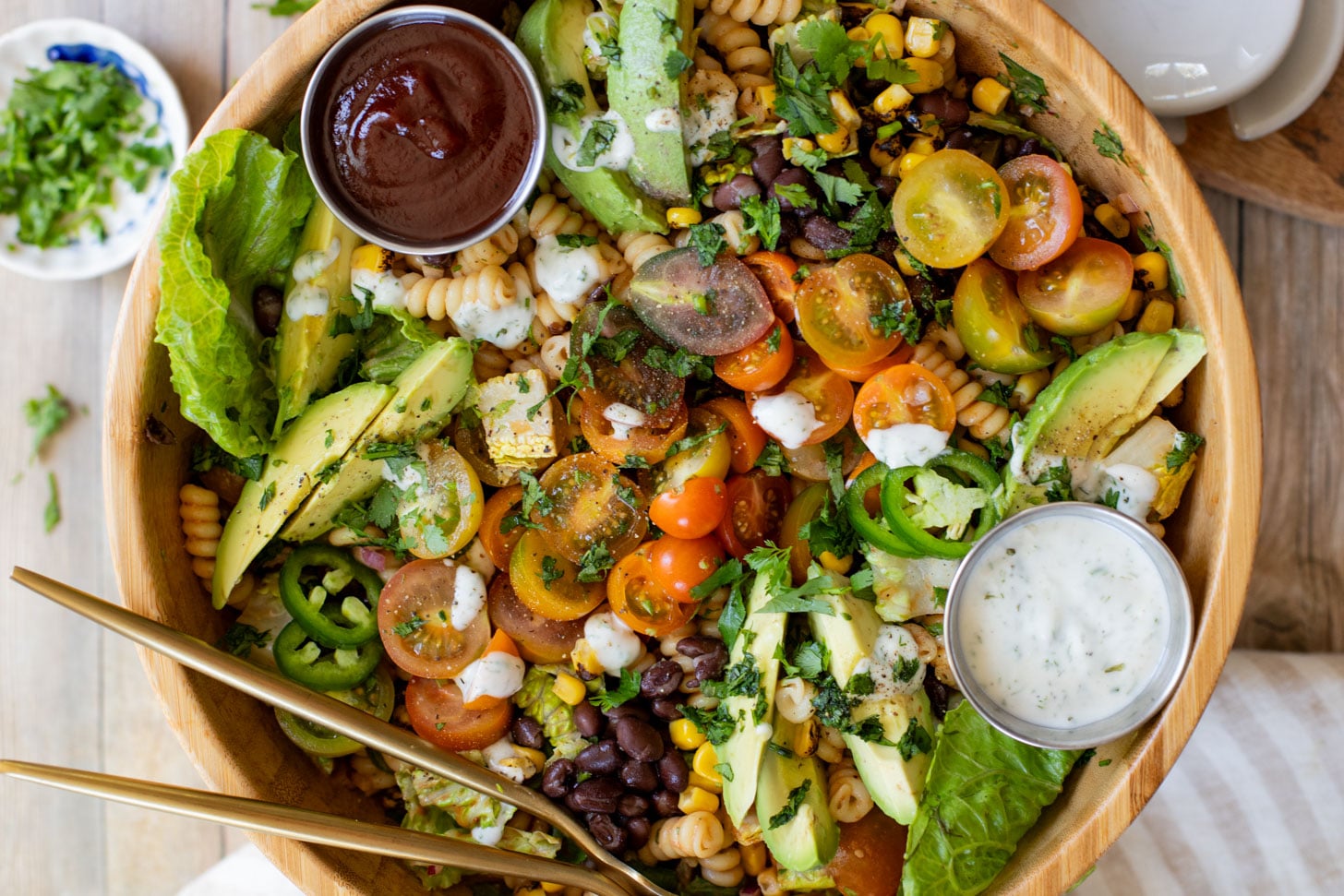 Nothing says summer like this vegan BBQ Ranch Pasta Salad - cold noodles, veggies & black beans with homemade vegan ranch & BBQ sauce | ThisSavoryVegan.com #pastasalad #summerrecipes #veganranch