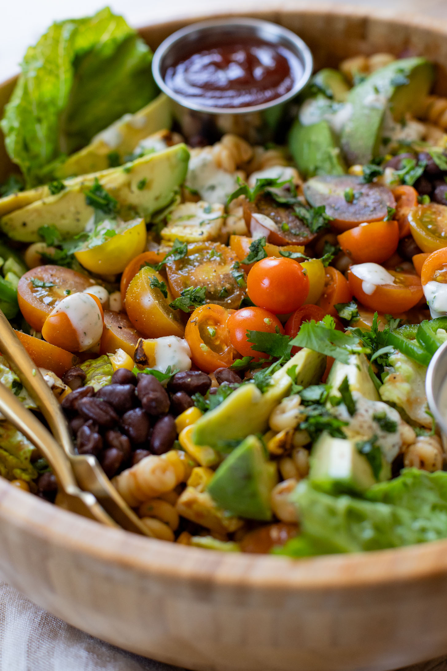 Nothing says summer like this vegan BBQ Ranch Pasta Salad - cold noodles, veggies & black beans with homemade vegan ranch & BBQ sauce | ThisSavoryVegan.com #pastasalad #summerrecipes #veganranch