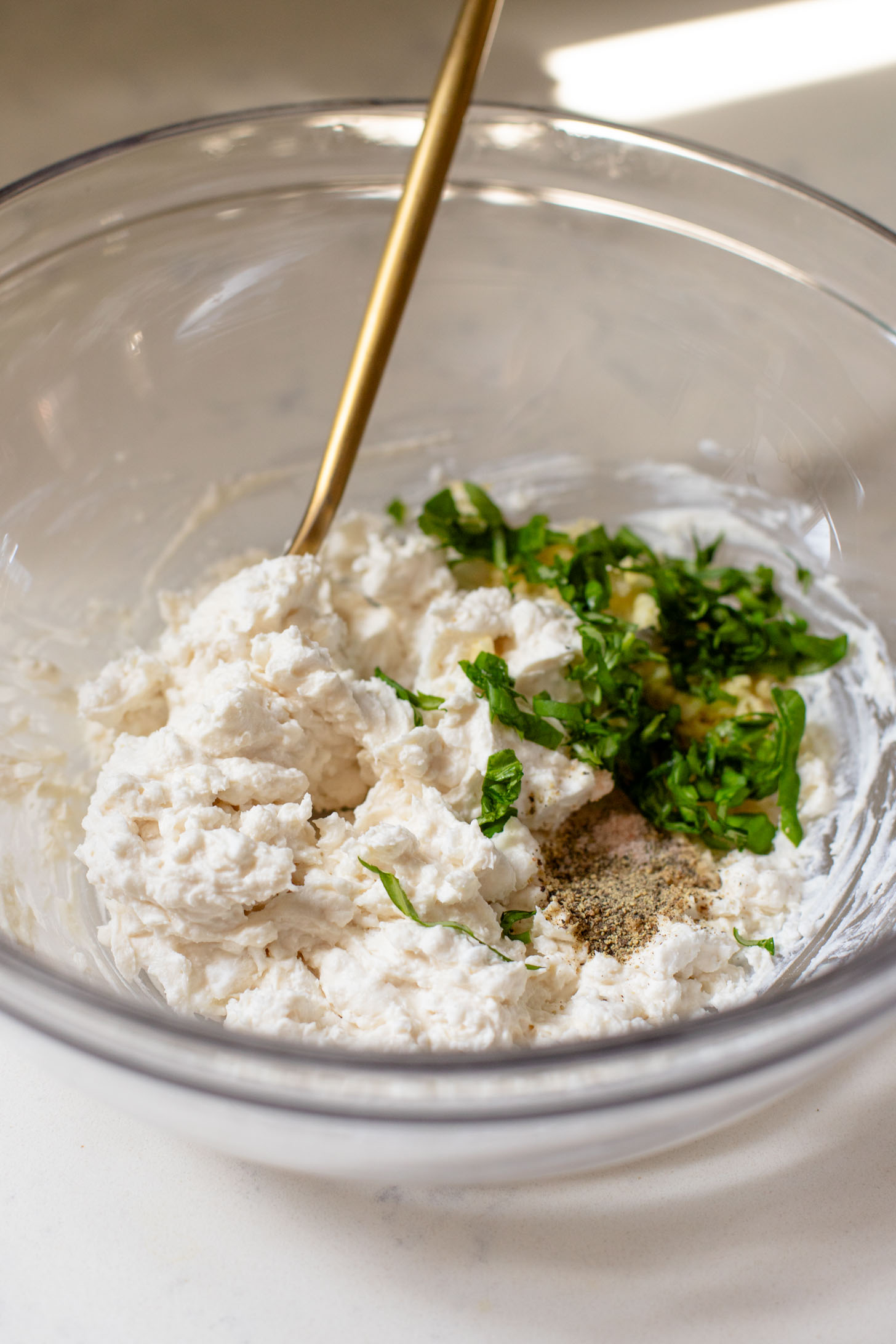 This vegan Heirloom Tomato Tart is made with puff pastry, a creamy non-dairy cheese, pesto & heirloom tomato slices. The perfect summer appetizer or brunch idea | ThisSavoryVegan.com #puffpastryideas #heirloomtomatorecipes #summerrecipes