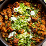 This Tempeh Enchilada Rice Skillet is the best one-pot vegan dinner recipe! Plenty of veggies, flavor-packed rice and crispy tempeh! Plus all of the tastiest plant-based toppings | ThisSavoryvegan.com #skilletdinner #vegandinnerideas #easydinnerideas