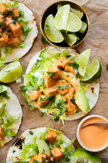 These Bang Bang Tofu Tacos have the perfect amount of spice, creaminess and crunch. The ultimate spicy vegan taco idea | ThisSavoeyVegan.com #thissavoryvegan #vegantacos #tofutacos