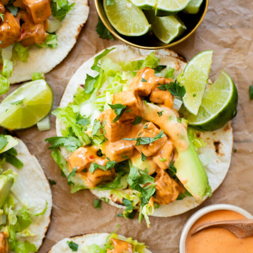These Bang Bang Tofu Tacos have the perfect amount of spice, creaminess and crunch. The ultimate spicy vegan taco idea | ThisSavoeyVegan.com #thissavoryvegan #vegantacos #tofutacos