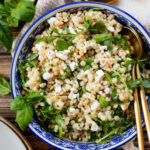 This Lemon Arugula Couscous Salad is a simple vegan salad that packs a ton of flavor! Made with pearl couscous and vegan feta. The perfect bite | ThisSavoryVegan.com #thissavoryvegan #summersalad #veganlunchideas
