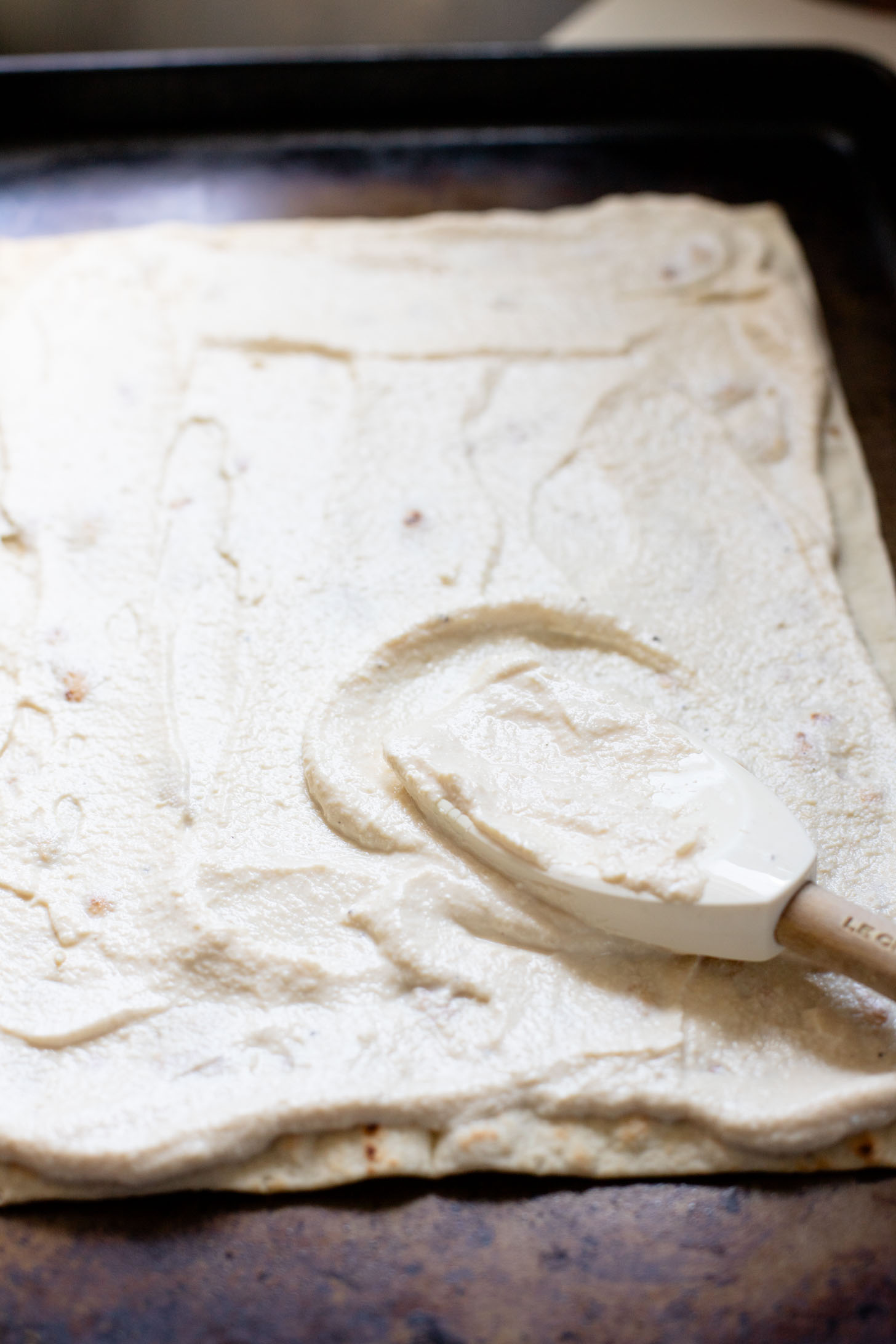 This Lemon Ricotta Lavash Pizza is the perfect vegan appetizer, lunch or light dinner! A super thin lavash crust, tofu ricotta and lots of toppings | ThisSavoryVegan.com #thissavoryvegan #veganpizza #veganappetizers