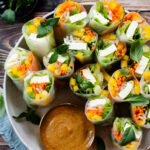 These Tofu Summer Rolls are a fresh and delicious meal. Veggie-packed and served up with the best peanut dipping sauce | ThisSavoryVegan.com #thissavoryvegan #ricepaperrolls #veganlunchideas