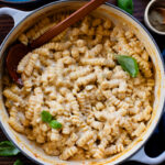 This Stovetop Vegan Mac & Cheese is made with 3 kinds of non-dairy cheese, green chiles and dry seasonings. The perfect one-pot recipe | ThisSavoryVegan.com #veganmacandcheese #onnepotrecipes #veganpasta