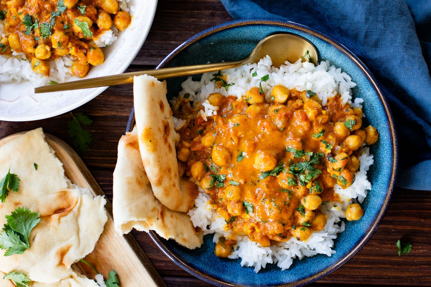 These Coconut Curry Chickpeas are vegan comfort food in a bowl. The chickpeas are braised in a coconut curry sauce and served over rice. Quick, easy, delicious dinner | ThisSavoryVegan.com #thissavoryvegan #fallrecipes #vegancurry