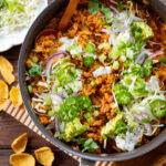 This Green Chile Rice Skillet is a one-pot vegan recipe filled with beans, rice, veggies & soyrizo. Served up with so many delicious toppings | ThisSavoryVegan.com #onepotrecipes #easyvegandinners #thissavoryvegan