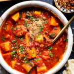 Warm and cozy, this Vegan Sausage & Potato Soup is the perfect dinner for cold nights. Made with vegan sausage, Yukon potatoes & spinach | ThisSavoryVegan.com #thissavoryvegan #vegansoup #veganfallrecipes