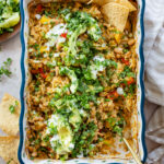 This Green Chile Rice Bake is the perfect one-pot dinner. Veggies, rice and beans are tossed together in a casserole dish and baked | ThisSavoryVegan.com #thissavoryvegan #vegancasserole #fallrecipes