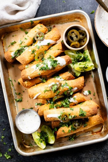 These Jalapeño Popper Soyrizo Taquitos are crunchy on the outside and creamy on the inside. Served with vegan ranch for dipping | ThisSavoryVegan.com #thissavoryvegan #vegantaquitos #rolledtacos