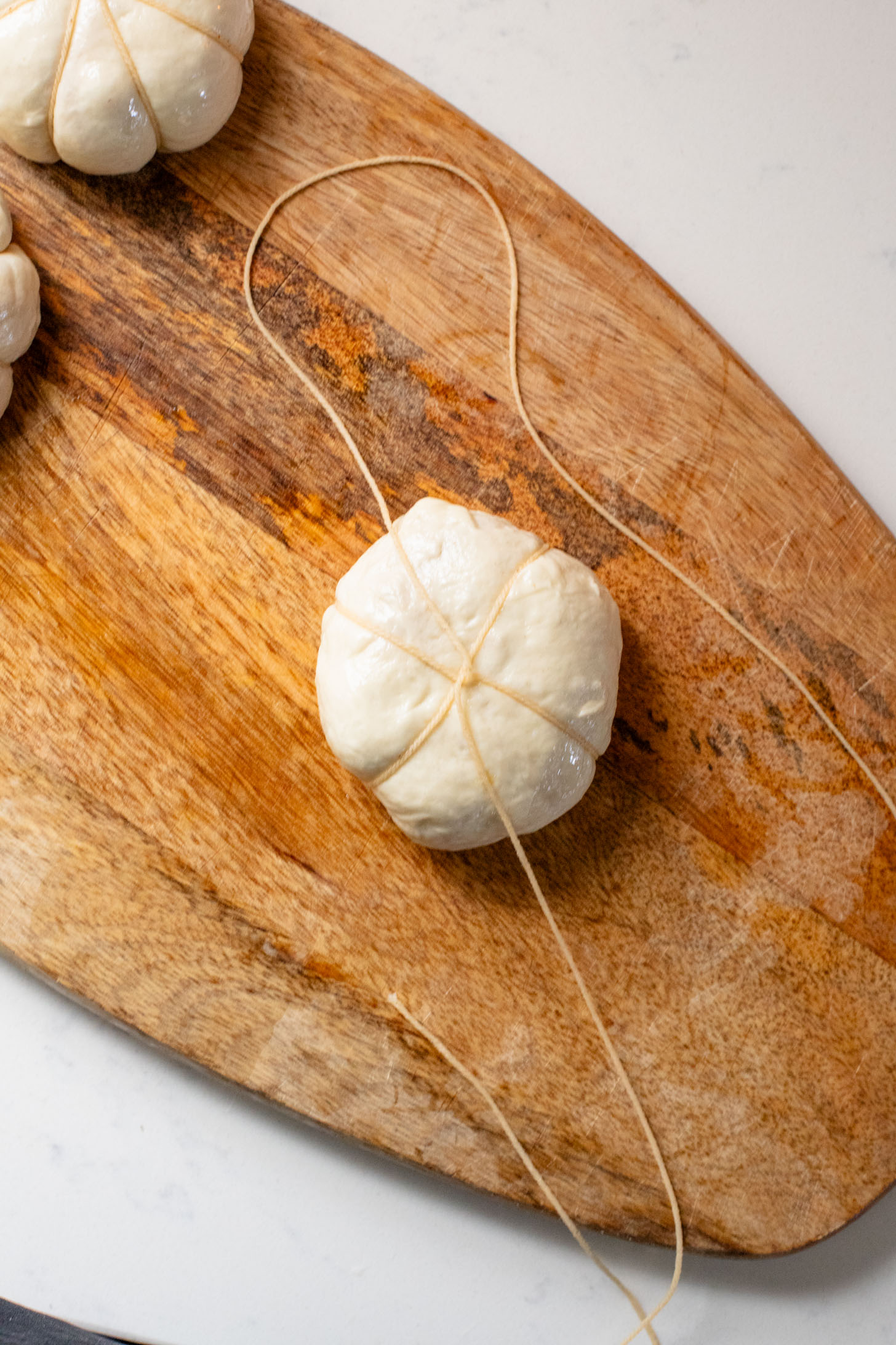 These Pumpkin Shaped Pizza Bites are stuffed with a mediterranean, dairy-free filling that is delicious! The perfect vegan fall recipe | ThisSavoryVegan.com #halloweenrecipes #thanksgivingrecipes #thanksgivingappetizers