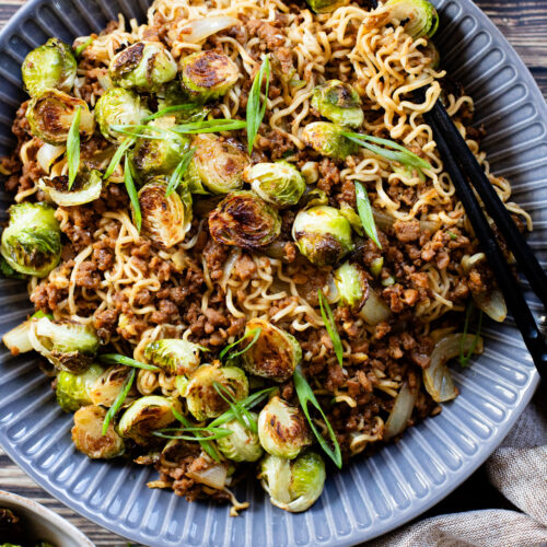 These Ramen Noodles & Miso Glazed Brussels Sprouts are a scrumptious vegan dinner! Noodles are cooked with vegan beef and served with crispy sprouts | ThisSavoryVegan.com #thissavoryvegan #noodles #vegannoodles