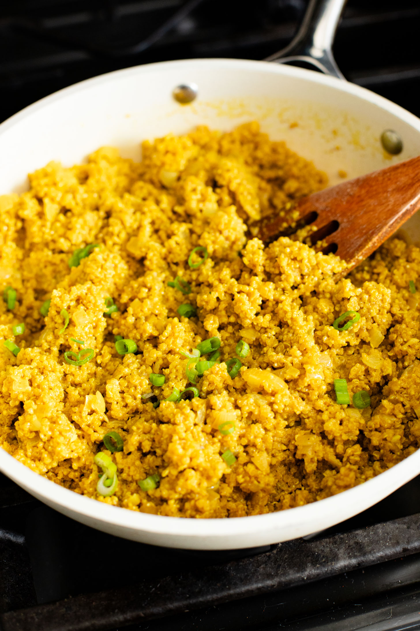 Simple and delicious, this Roasted Cauliflower & Curried Quinoa has Indian-inspired flavors and is ready in 35 minutes. A quick vegan weeknight dinner | ThisSavoryVegan.com #thissavoryvegan #quinoarecipes #roastedveggies