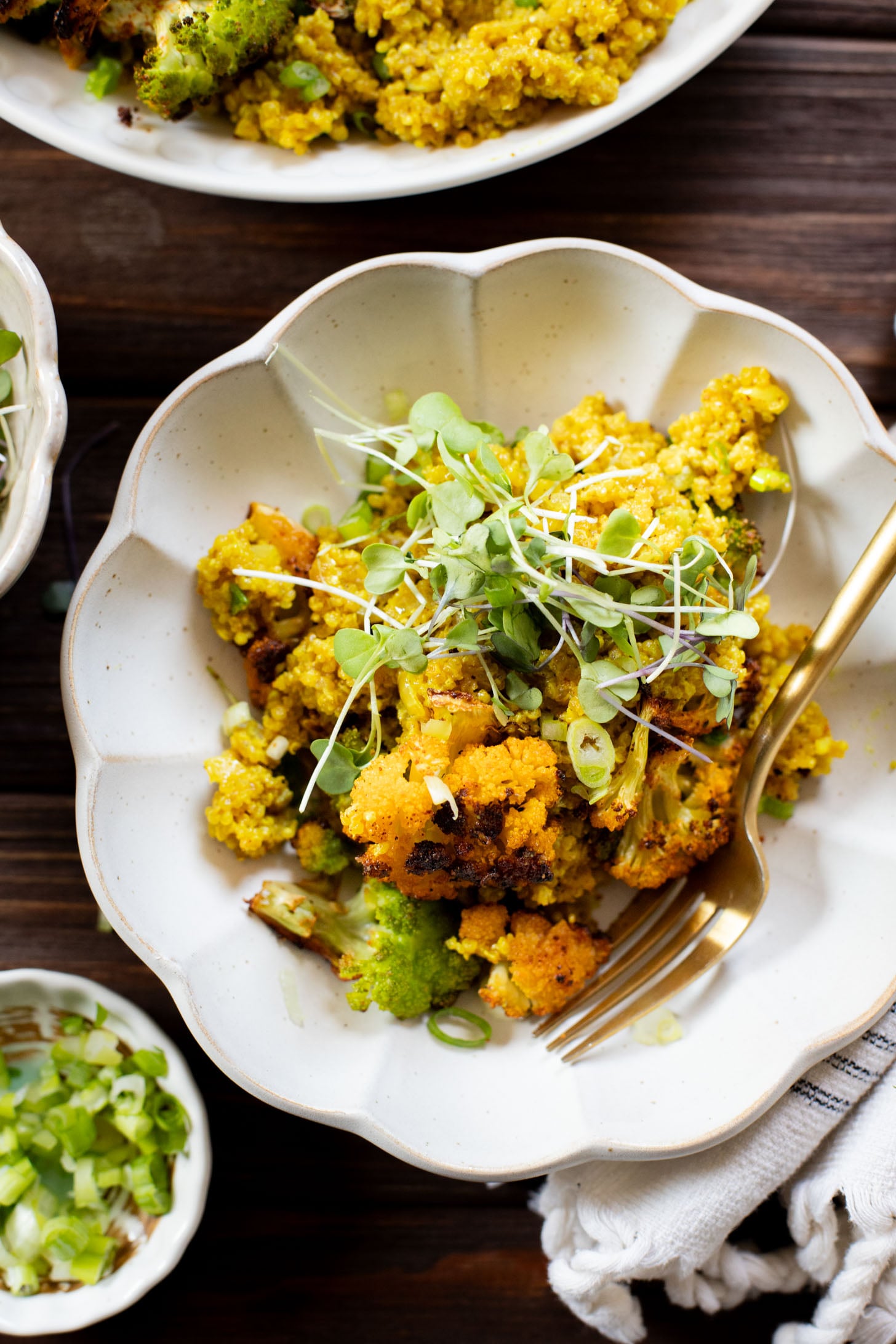 Simple and delicious, this Roasted Cauliflower & Curried Quinoa has Indian-inspired flavors and is ready in 35 minutes. A quick vegan weeknight dinner | ThisSavoryVegan.com #thissavoryvegan #quinoarecipes #roastedveggies