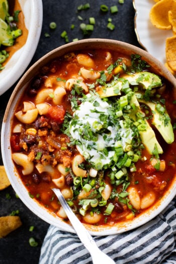 This Simple Macaroni Taco Soup is dairy-free and filled with black beans, soyrizo, a tomato base and macaroni. Ready in 30 minutes | ThisSavoryVegan.com #thissavoryvegan #tacosoup #vegansoup