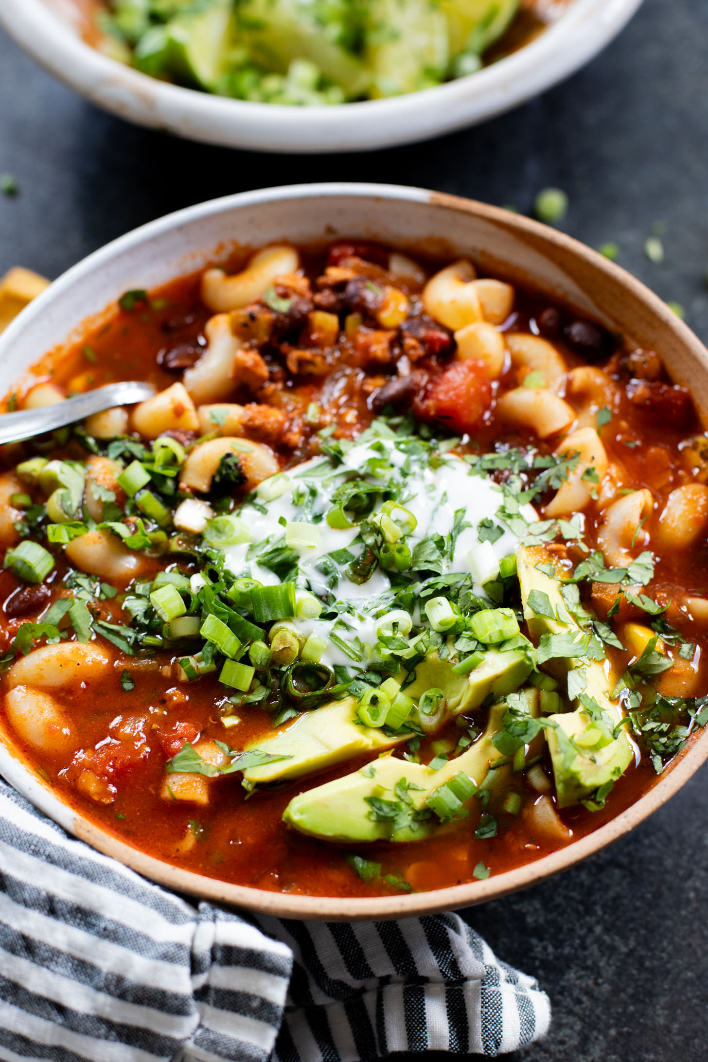 This Simple Macaroni Taco Soup is dairy-free and filled with black beans, soyrizo, a tomato base and macaroni. Ready in 30 minutes | ThisSavoryVegan.com #thissavoryvegan #tacosoup #vegansoup