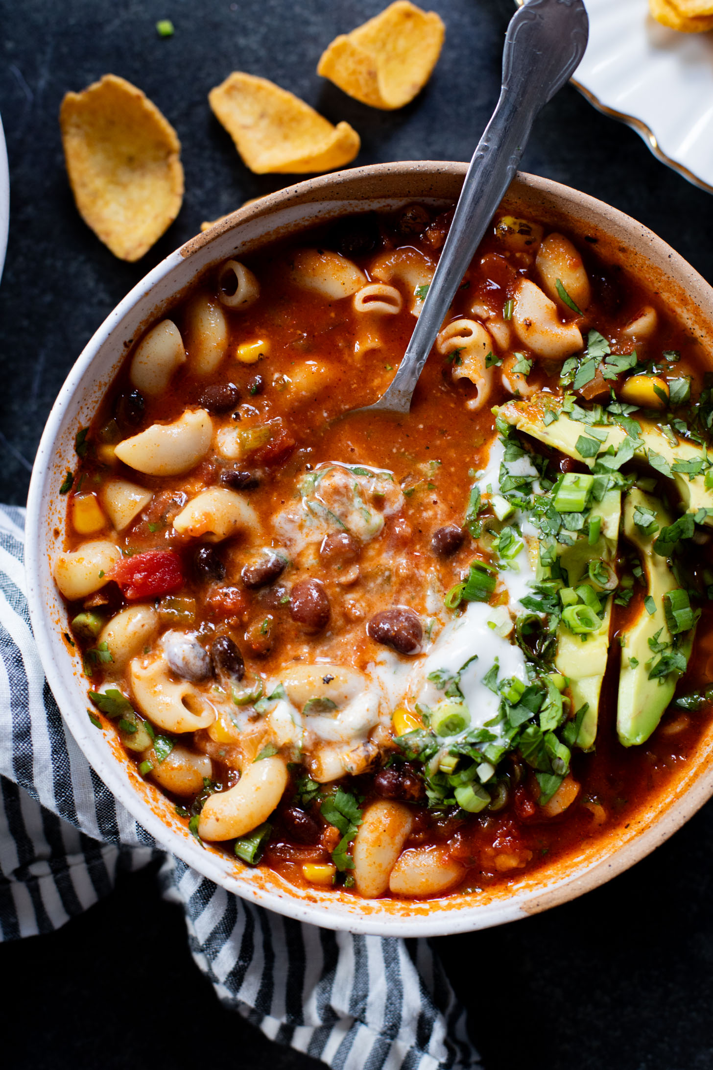 This Simple Macaroni Taco Soup is dairy-free and filled with black beans, soyrizo, a tomato base and macaroni. Ready in 30 minutes | ThisSavoryVegan.com #thissavoryvegan #tacosoup #vegansoup