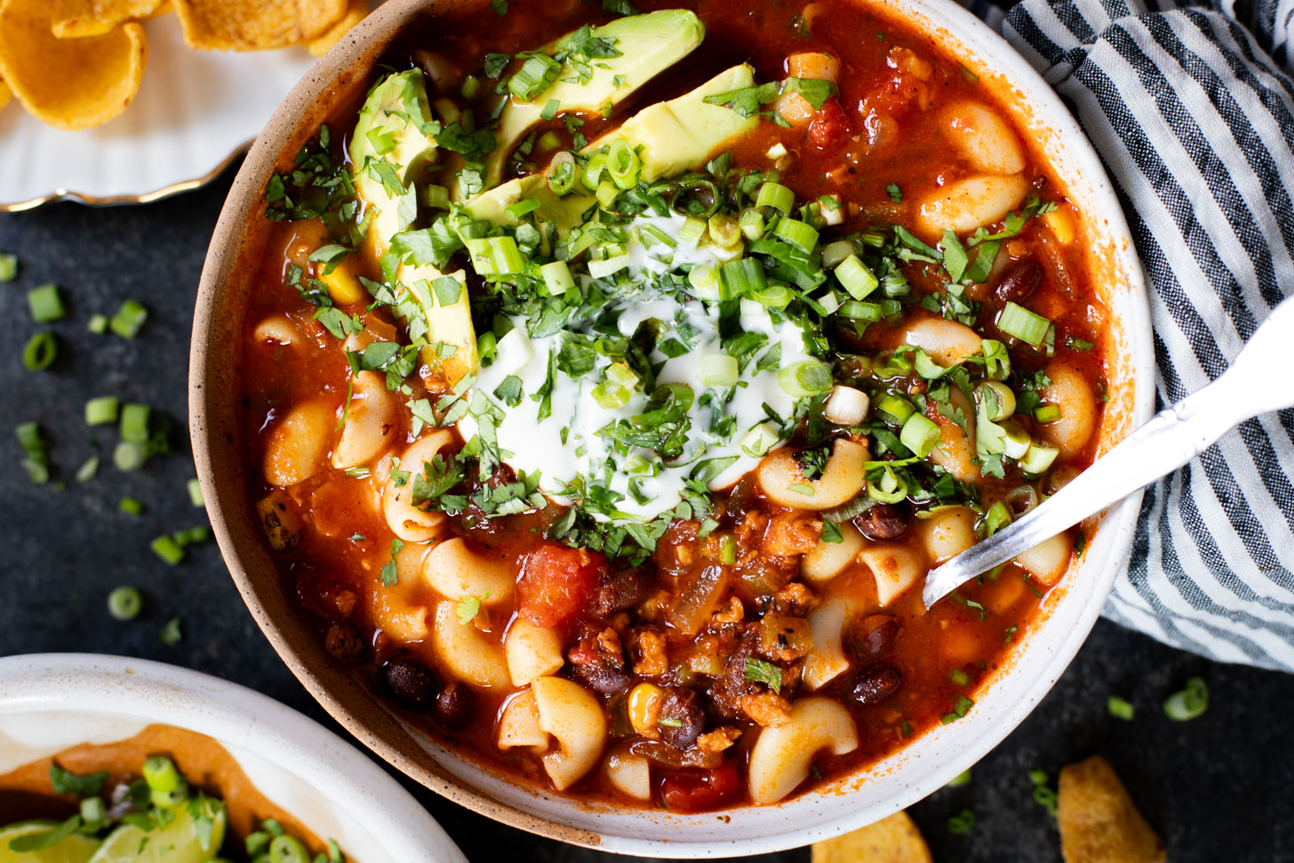 This Simple Macaroni Taco Soup is dairy-free and filled with black beans, soyrizo, a tomato base and macaroni. Ready in 30 minutes | ThisSavoryVegan.com #thissavoryvegan #tacosoup #vegansoup