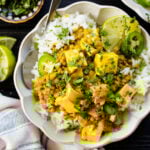 Comforting, healthy and delicious, this Tofu & Lentil Pumpkin Curry uses Indian-inspired flavors and is served up over rice for a comforting vegan dinner | ThisSavoryVegan.com #vegancurry #easycurry #pumpkinrecipes