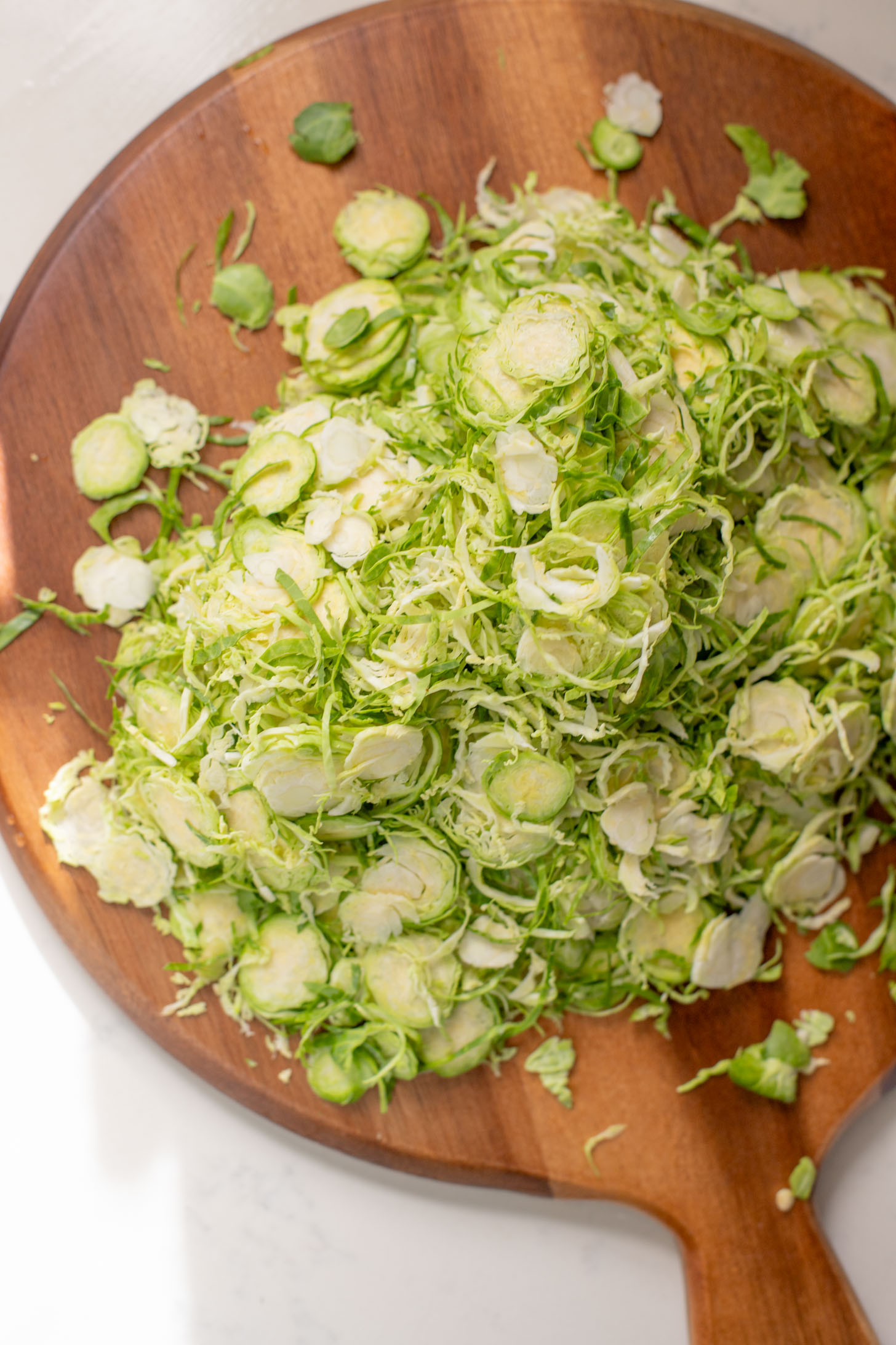 This Sesame Crusted Tofu Brussels Sprouts Salad is quick, light and protein packed. Raw shaved brussels sprouts and baked tofu in a maple dressing | ThisSavoryVegan.com #thissavoryvegan #bakedtofu #easytofurecipes