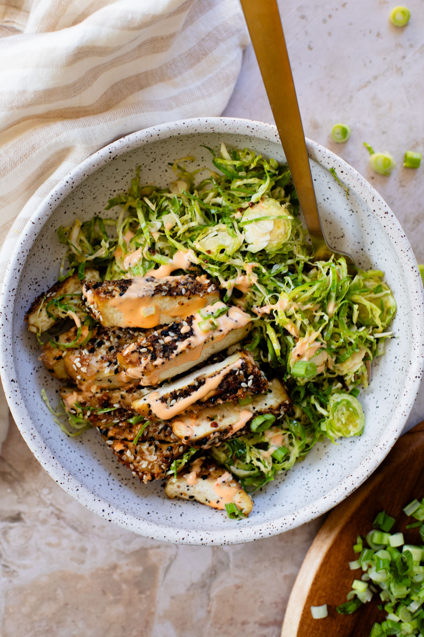 This Sesame Crusted Tofu Brussels Sprouts Salad is quick, light and protein packed. Raw shaved brussels sprouts and baked tofu in a maple dressing | ThisSavoryVegan.com #thissavoryvegan #bakedtofu #easytofurecipes