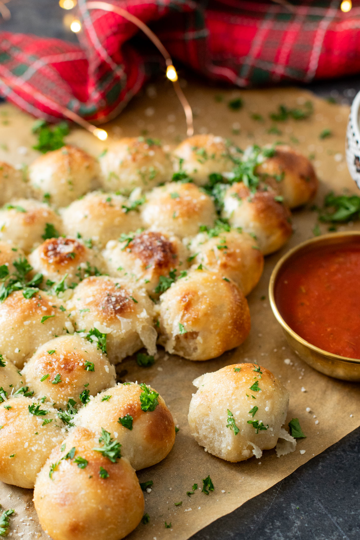 This Cheesy Pull-Apart Christmas Tree is pizza dough balls that are stuffed with a vegan jalapeño popper mixture. Perfect holiday appetizer | ThisSavoryVegan.com #thissavoryvegan #christmasappetizers #christmasrecipes