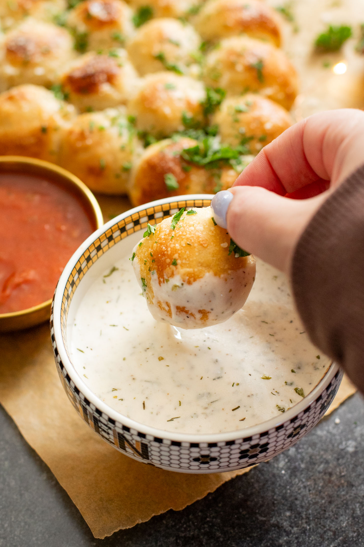 This Cheesy Pull-Apart Christmas Tree is pizza dough balls that are stuffed with a vegan jalapeño popper mixture. Perfect holiday appetizer | ThisSavoryVegan.com #thissavoryvegan #christmasappetizers #christmasrecipes