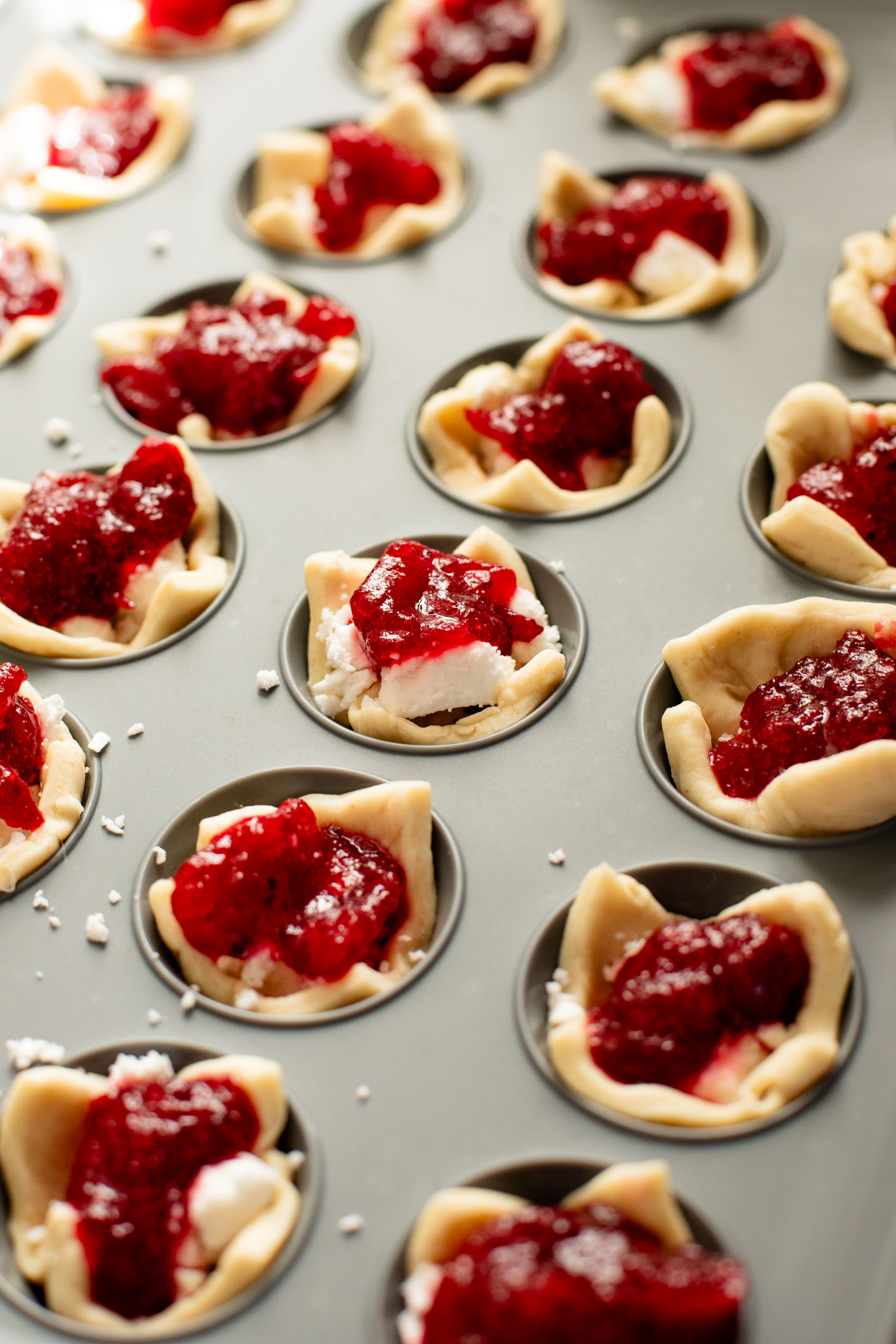 These Cranberry Feta Crescent Bites are the perfect holiday appetizer. They are dairy-free, made with simple ingredients and delicious | ThisSavoryVegan.com #thissavoryvegan #holidayappetizers #veganappetizers