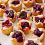 These Cranberry Feta Crescent Bites are the perfect holiday appetizer. They are dairy-free, made with simple ingredients and delicious | ThisSavoryVegan.com #thissavoryvegan #holidayappetizers #veganappetizers