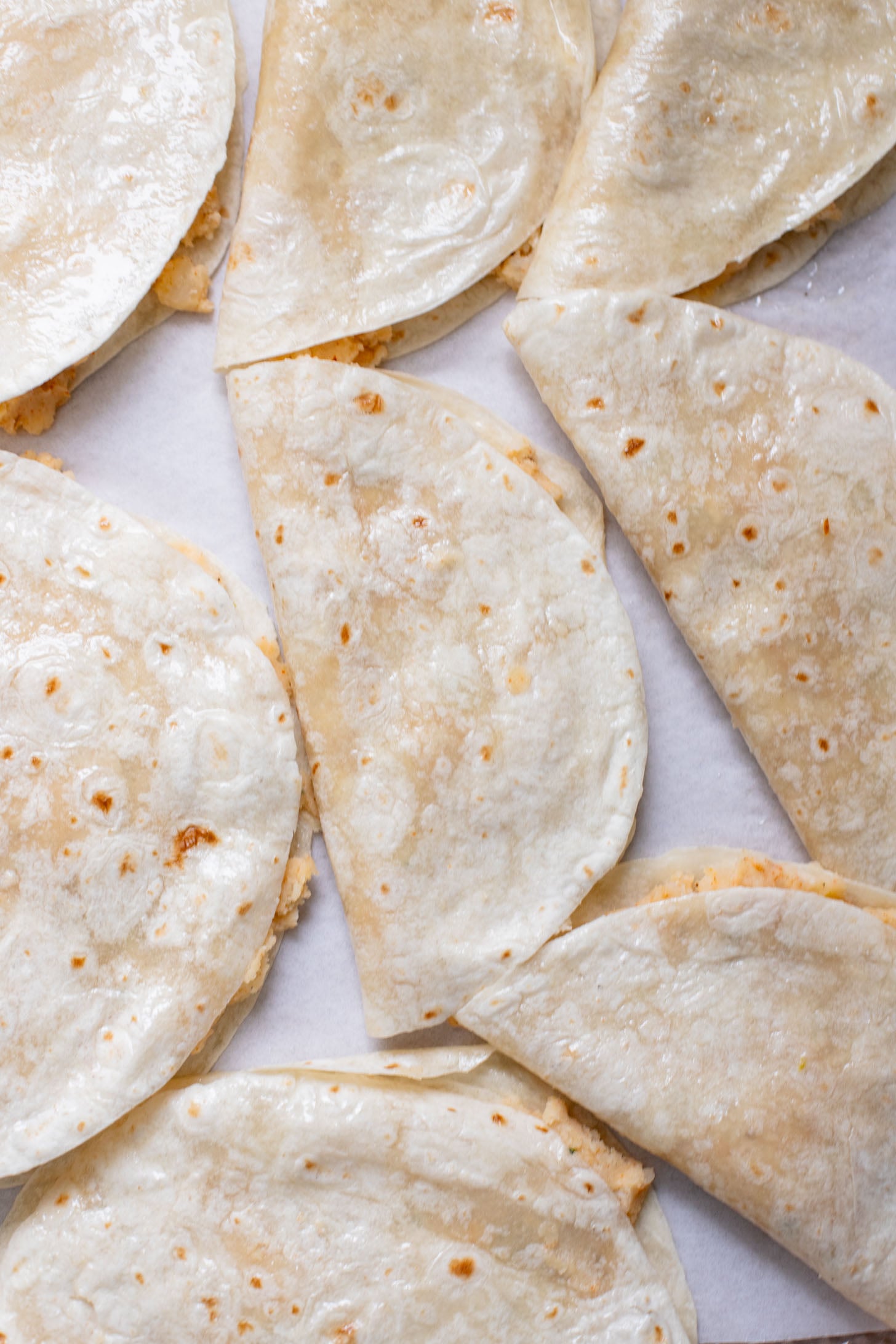 These Oven Baked Potato Tacos have a crispy outside & seasoned mashed potatoes inside. A perfect weeknight dinner when you want something easy | ThisSavoryVegan.com #thissavoryvegan #vegantacos #potatotacos