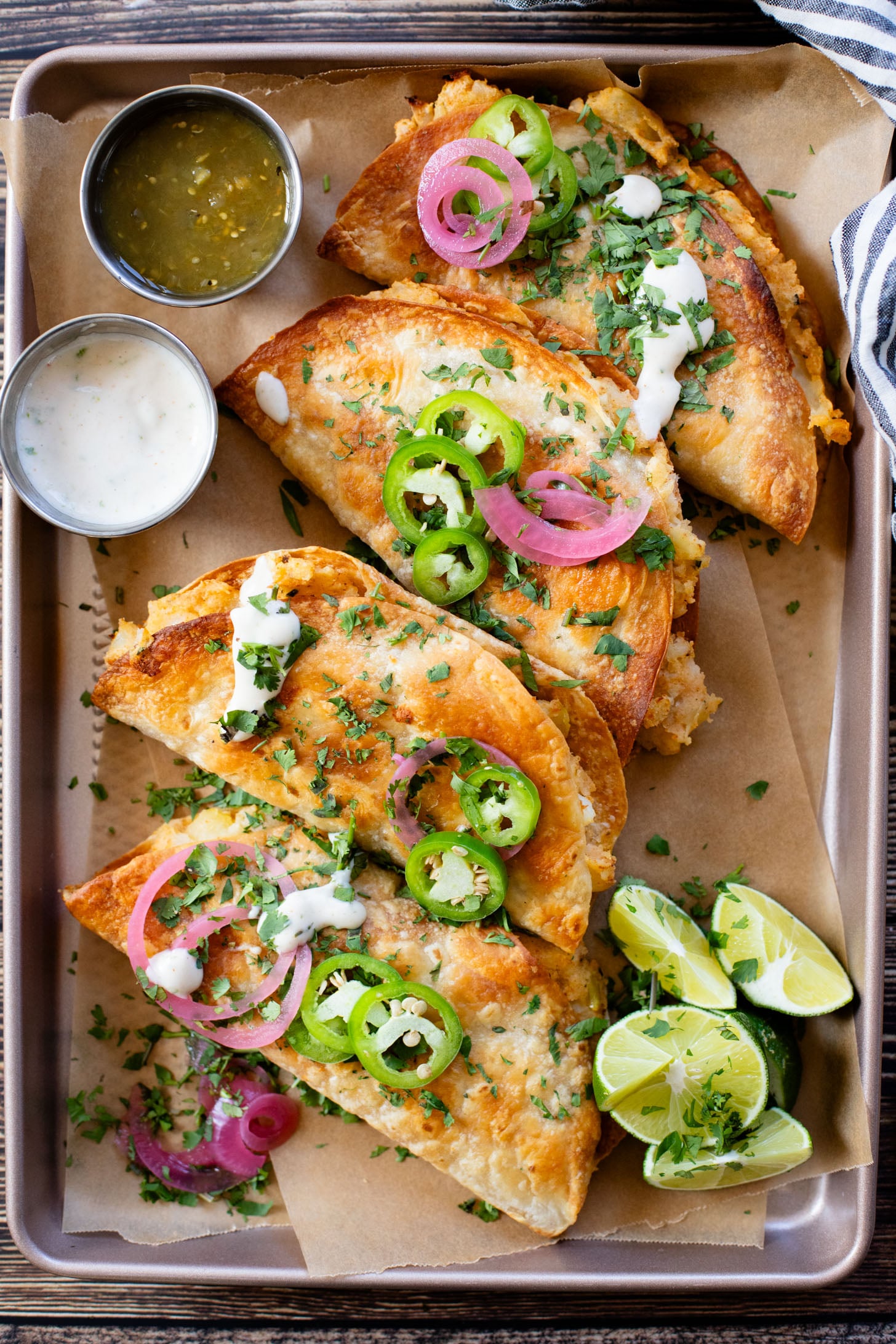 These Oven Baked Potato Tacos have a crispy outside & seasoned mashed potatoes inside. A perfect weeknight dinner when you want something easy | ThisSavoryVegan.com #thissavoryvegan #vegantacos #potatotacos