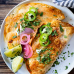 These Oven Baked Potato Tacos have a crispy outside & seasoned mashed potatoes inside. A perfect weeknight dinner when you want something easy | ThisSavoryVegan.com #thissavoryvegan #vegantacos #potatotacos
