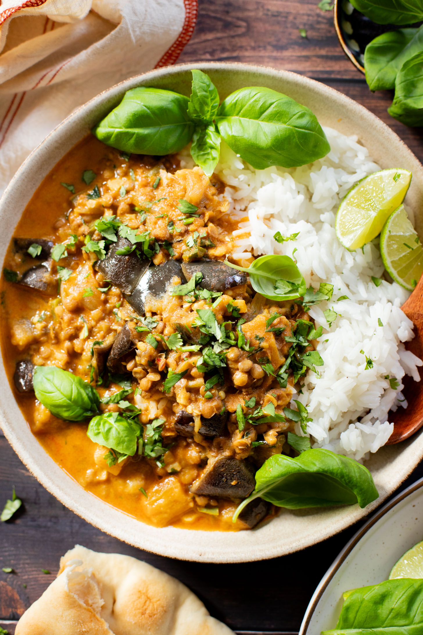 This Simple Eggplant Lentil Curry is made in one-pot with a red curry coconut broth. A flavor-packed and delicious vegan dinner idea | ThisSavoryVegan.com #thissavoryvegan #lentilcurry #vegancurry