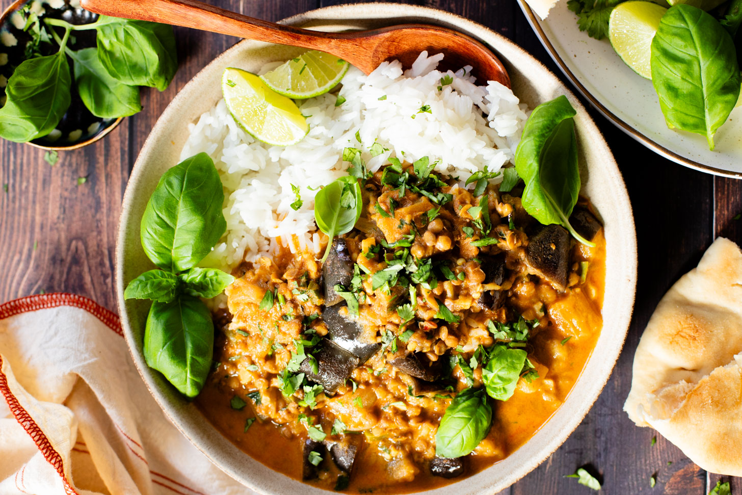 This Simple Eggplant Lentil Curry is made in one-pot with a red curry coconut broth. A flavor-packed and delicious vegan dinner idea | ThisSavoryVegan.com #thissavoryvegan #lentilcurry #vegancurry