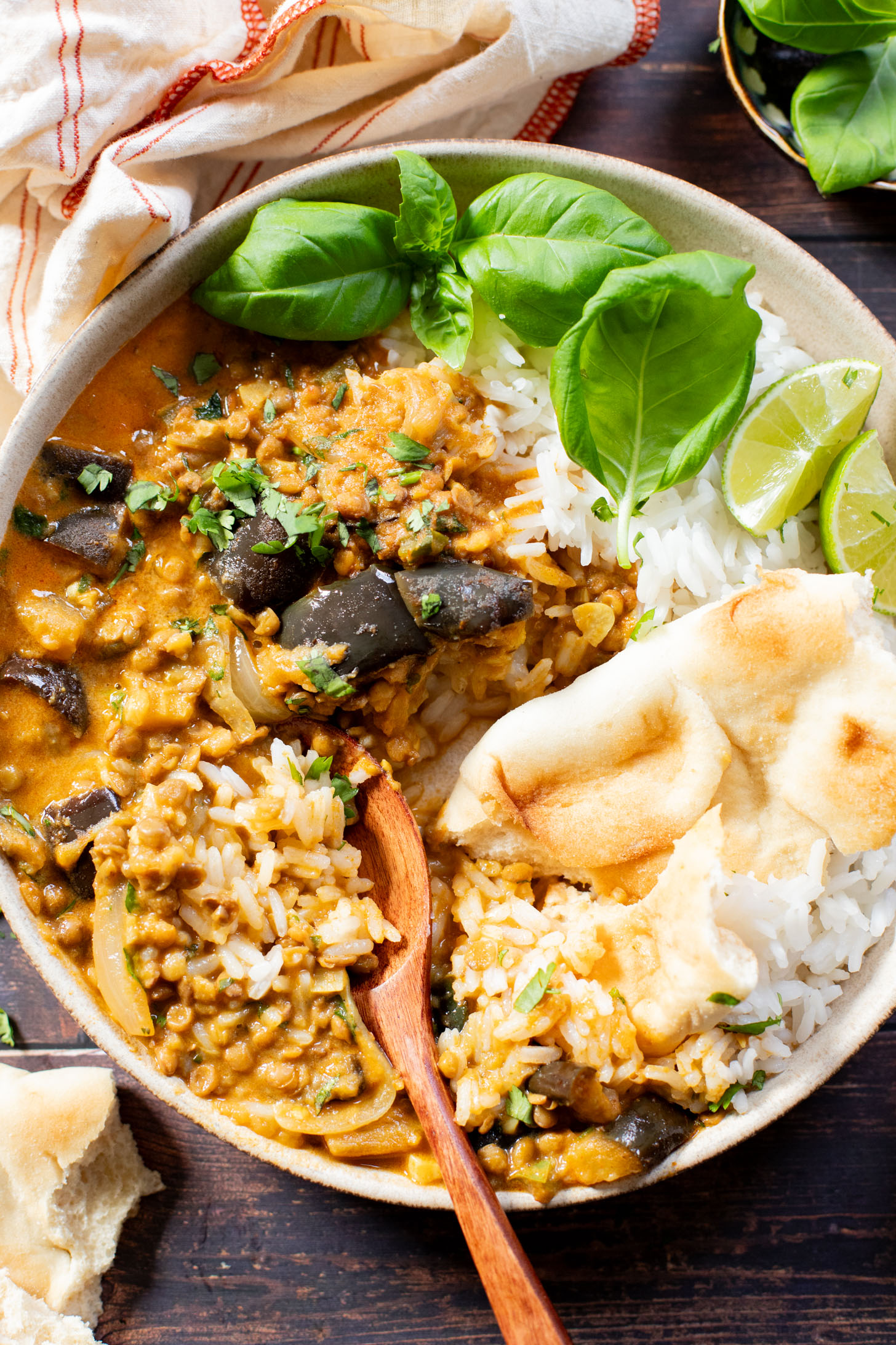 This Simple Eggplant Lentil Curry is made in one-pot with a red curry coconut broth. A flavor-packed and delicious vegan dinner idea | ThisSavoryVegan.com #thissavoryvegan #lentilcurry #vegancurry