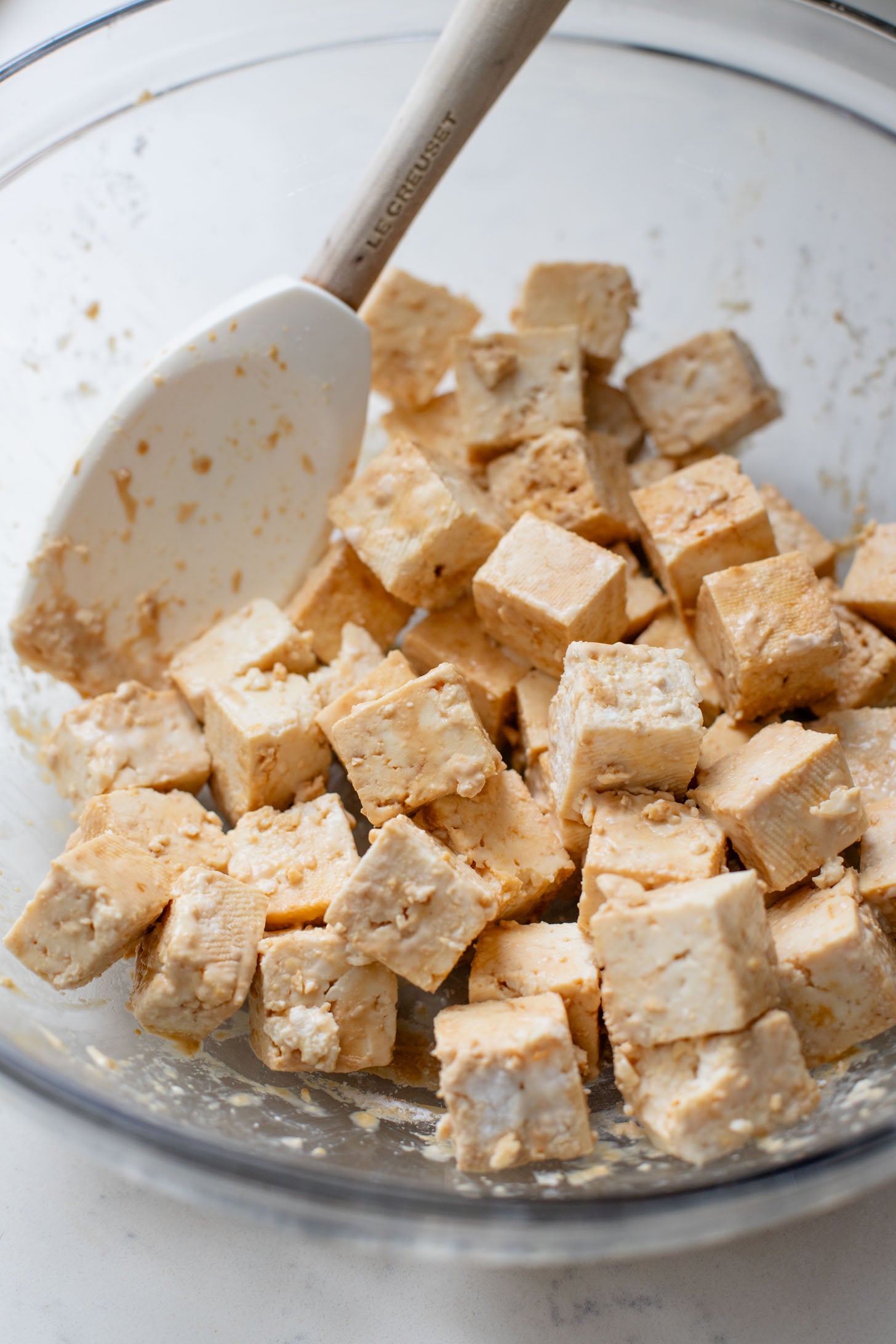 This Golden Coconut Noodle Soup is healthy & heart warming. A coconut curry broth, crispy baked tofu & tender rice noodles | ThisSavoryVegan.com #vegansoup #noodlesoup #healthysoup