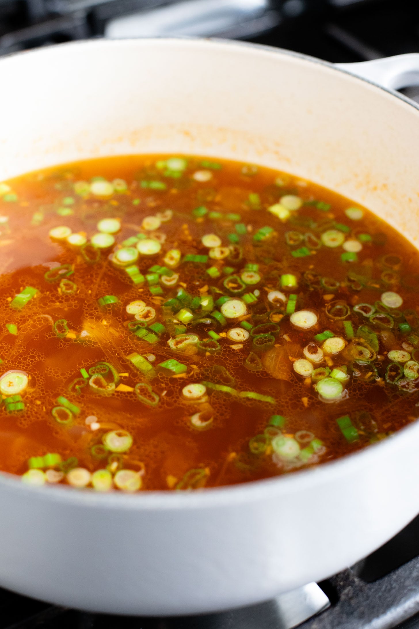 This Roasted Veggie Ramen is filled with crispy cauliflower & carrots in a delicious vegan broth. Finished off with tender ramen noodles for a cozy dinner | ThisSavoryVegan.com #thissavoryvegan #vegannramen #easyramenrecipe