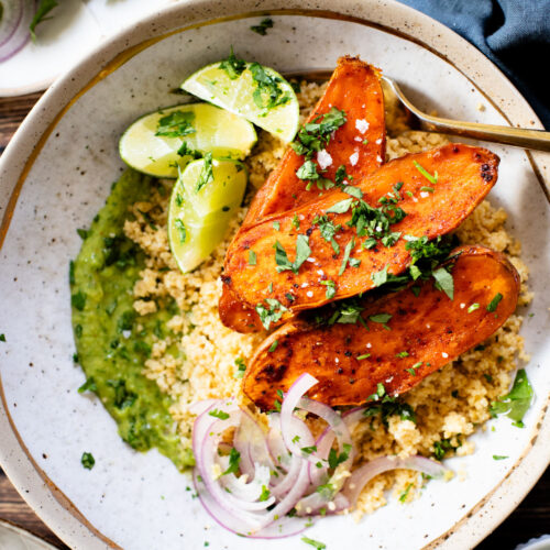 These Roasted Sweet Potato Bowls are layered with couscous, tender roasted sweet potatoes and an avocado cilantro sauce | ThisSavoryVegan.com #thissavoryvegan #grainbowl #veggiebowl